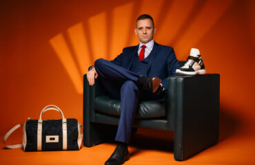 Lian Ospelt sitting with products - Aurora